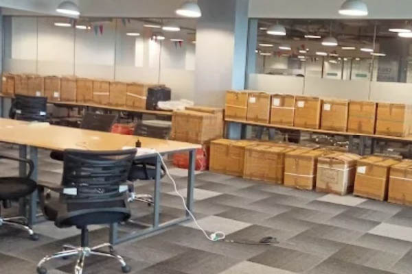 Office furniture and equipment packed for corporate relocation